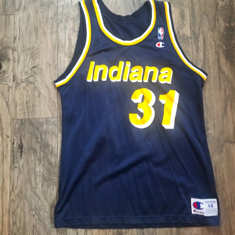 Like new vintage champion Pacers Reggie Miller jersey.  Size 44